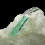 Beryl (variety emerald), Calcite<br />La Pita mining district, Municipio Maripí, Western Emerald Belt, Boyacá Department, Colombia<br />46x85x20mm, xls=26, 16 & 13mm<br /> (Author: Fiebre Verde)