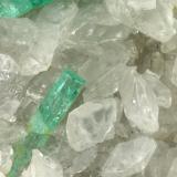 Beryl (variety emerald), Calcite<br />La Pita mining district, Municipio Maripí, Western Emerald Belt, Boyacá Department, Colombia<br />46x85x20mm, xls=26, 16 & 13mm<br /> (Author: Fiebre Verde)