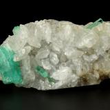 Beryl (variety emerald), Calcite<br />La Pita mining district, Municipio Maripí, Western Emerald Belt, Boyacá Department, Colombia<br />46x85x20mm, xls=26, 16 & 13mm<br /> (Author: Fiebre Verde)