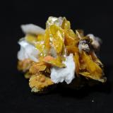 Barite on Wulfenite and Mimetite<br />San Francisco Mine, Cerro Prieto, Cucurpe, Municipio Cucurpe, Sonora, Mexico<br />5.7 x 4.6 x 3.4 cm<br /> (Author: steven calamuci)