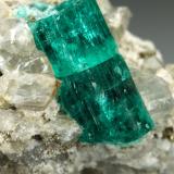 Beryl (variety emerald), Dolomite, Pyrite<br />Chivor mining district, San Gregorio Mine, Municipio Chivor, Eastern Emerald Belt, Boyacá Department, Colombia<br />21x58x31mm, largest xl=13mm<br /> (Author: Fiebre Verde)