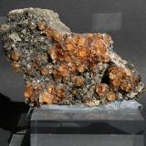 Grossular (variety hessonite)Jeffrey Mine, Asbestos, Les Sources RCM, Estrie, Québec, Canada80mm x 50mm 10 mm (Author: Philippe Durand)