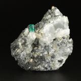 Beryl (variety emerald), Calcite<br />Coscuez mining district, Municipio San Pablo de Borbur, Western Emerald Belt, Boyacá Department, Colombia<br />59x20x60mm, xl=7x5mm<br /> (Author: Fiebre Verde)