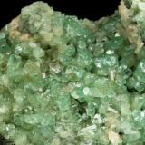 Beryl (variety emerald), Albite (variety cleavelandite), Quartz, Calcite<br />Coscuez mining district, Calceteros Mine, Municipio San Pablo de Borbur, Western Emerald Belt, Boyacá Department, Colombia<br />96x75x33mm, xls up to 10mm<br /> (Author: Fiebre Verde)