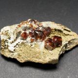 Garnet (Group)<br />Shigar Valley, Shigar District, Gilgit-Baltistan (Northern Areas), Pakistan<br />70mm x 40mm x 20mm<br /> (Author: Philippe Durand)