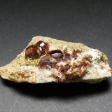 Garnet (Group)<br />Shigar Valley, Shigar District, Gilgit-Baltistan (Northern Areas), Pakistan<br />70mm x 40mm x 20mm<br /> (Author: Philippe Durand)