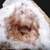 Hematite on Quartz<br />Monroe County, Indiana, USA<br />about 10cm x 8cm the cavity<br /> (Author: Bob Harman)