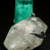 Beryl (variety emerald), Calcite<br />La Pita mining district, Municipio Maripí, Western Emerald Belt, Boyacá Department, Colombia<br />xl=25x8mm<br /> (Author: Fiebre Verde)