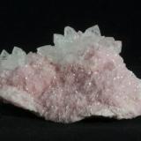 Quartz on Rhodochrosite<br />Cavnic Mine, Cavnic mining area, Cavnic, Maramures, Romania<br />5.9 x 4.5 x 2.9 cm<br /> (Author: steven calamuci)