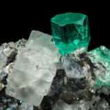 Beryl (variety emerald), Calcite, Fluorite<br />Chivor mining district, Municipio Chivor, Eastern Emerald Belt, Boyacá Department, Colombia<br />25x24x21mm, main xl=10mm<br /> (Author: Fiebre Verde)