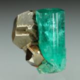 Beryl (variety emerald), Pyrite<br />Chivor mining district, Municipio Chivor, Eastern Emerald Belt, Boyacá Department, Colombia<br />xl=19x7.5mm<br /> (Author: Fiebre Verde)