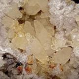 Calcite, Dolomite, Barite and Sphalerite on Quartz<br />State Route 37 road cuts, Harrodsburg, Clear Creek Township, Monroe County, Indiana, USA<br />the largest doubly terminated calcite is 7 cm<br /> (Author: Bob Harman)