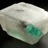 Beryl (variety emerald), Calcite, Dolomite<br />Muzo mining district, Western Emerald Belt, Boyacá Department, Colombia<br />25x23x21mm, main xl=12mm<br /> (Author: Fiebre Verde)