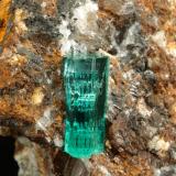 Beryl (variety emerald), Calcite<br />Chivor mining district, Buena Vista Mine, Municipio Ubalá, Eastern Emerald Belt, Cundinamarca Department, Colombia<br />44x55x36mm, xl=13mm<br /> (Author: Fiebre Verde)