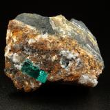 Beryl (variety emerald), Calcite<br />Chivor mining district, Buena Vista Mine, Municipio Ubalá, Eastern Emerald Belt, Cundinamarca Department, Colombia<br />44x55x36mm, xl=13mm<br /> (Author: Fiebre Verde)