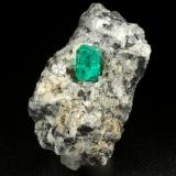 Beryl (variety emerald), Calcite<br />La Pita mining district, Cunas Mine, Municipio Maripí, Western Emerald Belt, Boyacá Department, Colombia<br />27x33x35mm, xl=9mm<br /> (Author: Fiebre Verde)