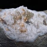 Baryte and Dolomite on QuartzHarrodsburg area, Clear Creek Township, Monroe County, Indiana, USA12 cm with the grouping being 5 cm and the largest Baryte being 2 cm (Author: Bob Harman)