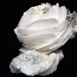 Calcita<br />Mina Yaogangxian, Yizhang, Prefectura Chenzhou, Provincia Hunan, China<br />Rosa 25x25 mm<br /> (Autor: Ramon A  Lopez Garcia)