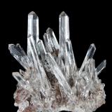 Quartz, Siderite<br />À Giraud Mine, La Gardette mining area, Villard-Nôtre-Dame, Le Bourg d'Oisans, Grenoble, Isère, Auvergne-Rhône-Alpes, France<br />65mm x 63mm x 37mm. Main crystal: 49mm tall, 9mm wide<br /> (Author: Carles Millan)