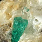 Beryl (variety emerald), Calcite, Quartz<br />Peñas Blancas Mine, Municipio San Pablo de Borbur, Western Emerald Belt, Boyacá Department, Colombia<br />52x32x40mm, main xl=10mm<br /> (Author: Fiebre Verde)