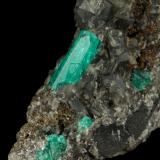 Beryl (variety emerald), Calcite, Pyrite<br />Muzo mining district, Western Emerald Belt, Boyacá Department, Colombia<br />43x85x85mm, xl=13mm<br /> (Author: Fiebre Verde)