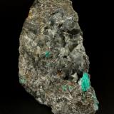 Beryl (variety emerald), Calcite, Pyrite<br />Muzo mining district, Western Emerald Belt, Boyacá Department, Colombia<br />43x85x85mm, xl=13mm<br /> (Author: Fiebre Verde)