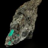 Beryl (variety emerald), Calcite, Pyrite<br />Muzo mining district, Western Emerald Belt, Boyacá Department, Colombia<br />43x85x85mm, xl=13mm<br /> (Author: Fiebre Verde)