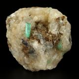 Beryl (variety emerald), Calcite<br />La Pita mining district, Polveros Mine, Municipio Maripí, Western Emerald Belt, Boyacá Department, Colombia<br />67x75x65mm, main xl=14mm<br /> (Author: Fiebre Verde)