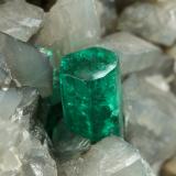 Beryl (variety emerald), Calcite, Dolomite, Pyrite<br />La Pita mining district, Polveros Mine, Municipio Maripí, Western Emerald Belt, Boyacá Department, Colombia<br />58x78x96mm, xl=9mm<br /> (Author: Fiebre Verde)