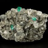 Beryl (variety emerald), Calcite, Dolomite<br />La Pita mining district, Municipio Maripí, Western Emerald Belt, Boyacá Department, Colombia<br />81x58x36mm, xls up to 6mm<br /> (Author: Fiebre Verde)