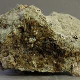 Axinita-(Mn)Mina Iron Cap, Landsman Camp, Aravaipa, Distrito Aravaipa, Montes Santa Teresa, Condado Graham, Arizona, USA51x33x24 mm (Autor: Juan Espino)