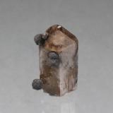 Topaz, Hematite after Garnet<br />Maynard's claim, Pismire Knolls Mount, Thomas Range, Juab County, Utah, USA<br />32mm x 16mm x 10mm<br /> (Author: Don Lum)