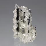 Stibnite, Calcite<br />Xikuangshan Sb deposit, Lengshuijiang, Loudi Prefecture, Hunan Province, China<br />56mm x 37mm x 30mm<br /> (Author: Don Lum)
