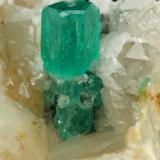 Beryl (variety emerald), Calcite, Quartz<br />Peñas Blancas Mine, Municipio San Pablo de Borbur, Western Emerald Belt, Boyacá Department, Colombia<br />78x51x44mm, main xl=12mm<br /> (Author: Fiebre Verde)