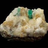 Beryl (variety emerald), Calcite, Quartz<br />Peñas Blancas Mine, Municipio San Pablo de Borbur, Western Emerald Belt, Boyacá Department, Colombia<br />78x51x44mm, main xl=12mm<br /> (Author: Fiebre Verde)