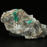 Beryl (variety emerald), Albite (variety cleavelandite), Pyrite, Calcite<br />Chivor mining district, Manantial Mine, Municipio Chivor, Eastern Emerald Belt, Boyacá Department, Colombia<br />44x23x24mm, main xl=8mm<br /> (Author: Fiebre Verde)