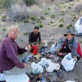 _Unwrapping specimens after a hard days effort. From left to right: Mike Sanders, Fred Ortega, Chris Cowan. Phil Simmons photo. (Author: Philip Simmons)