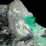 Beryl (variety emerald), Calcite, Dolomite<br />La Pita mining district, Cunas Mine, Municipio Maripí, Western Emerald Belt, Boyacá Department, Colombia<br />56x44x51mm, xls=7mm & 4mm<br /> (Author: Fiebre Verde)