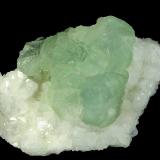 Fluorite on Quartz<br />Wutong Mine, Liubao, Cangwu, Wuzhou Prefecture, Guangxi Zhuang Autonomous Region, China<br />106 x 79 x 48 mm<br /> (Author: GneissWare)