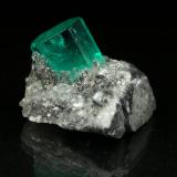 Beryl (variety emerald), Calcite<br />Muzo mining district, Western Emerald Belt, Boyacá Department, Colombia<br />xl=9x7mm<br /> (Author: Fiebre Verde)