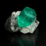 Beryl (variety emerald), Calcite<br />Muzo mining district, Western Emerald Belt, Boyacá Department, Colombia<br />xl=9x7mm<br /> (Author: Fiebre Verde)