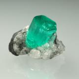 Beryl (variety emerald), Calcite<br />Muzo mining district, Western Emerald Belt, Boyacá Department, Colombia<br />xl=9x7mm<br /> (Author: Fiebre Verde)