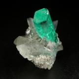 Beryl (variety emerald), Calcite, Dolomite<br />Coscuez mining district, Municipio San Pablo de Borbur, Western Emerald Belt, Boyacá Department, Colombia<br />xl=18x6mm<br /> (Author: Fiebre Verde)