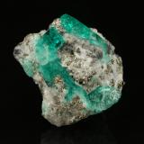 Beryl (variety emerald), Albite (variety cleavelandite), Calcite, Pyrite<br />Chivor mining district, Municipio Chivor, Eastern Emerald Belt, Boyacá Department, Colombia<br />24x26x12mm, largest xl=14mm<br /> (Author: Fiebre Verde)