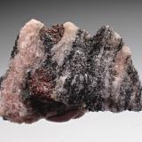 Gneiss, Garnet (Group)<br />Bissett Creek Mine, Maria Township, Renfrew County, Ontario, Canada<br />28.4mm x 21.3mm x 6.6mm<br /> (Author: Don Lum)