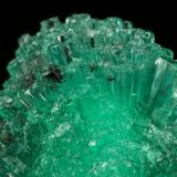 Beryl (variety emerald), Calcite<br />Coscuez mining district, Municipio San Pablo de Borbur, Western Emerald Belt, Boyacá Department, Colombia<br />24mm across<br /> (Author: Fiebre Verde)