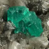 Beryl (variety emerald), Calcite, Dolomite<br />Muzo mining district, Western Emerald Belt, Boyacá Department, Colombia<br />79x49x66mm, largest xl=13x9mm<br /> (Author: Fiebre Verde)