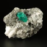 Beryl (variety emerald), Calcite, Dolomite<br />Muzo mining district, Western Emerald Belt, Boyacá Department, Colombia<br />79x49x66mm, largest xl=13x9mm<br /> (Author: Fiebre Verde)