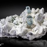 Beryl (variety aquamarine) on Microcline<br />Dassu, Braldu Valley, Shigar District, Gilgit-Baltistan (Northern Areas), Pakistan<br />150 x 89 mm<br /> (Author: Manuel Mesa)