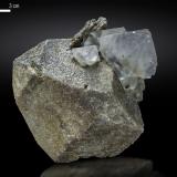 Scheelite and Fluorite<br />Huanggang Mines, Hexigten Banner (Kèshíkèténg Qí), Chifeng (Ulanhad), Inner Mongolia Autonomous Region, China<br />94 X 86 mm<br /> (Author: Manuel Mesa)